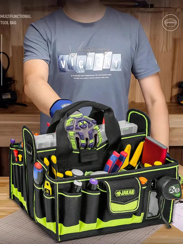 40-pocket tool tote in black with neon green trim, JAKAR logo, filled with hand tools.
