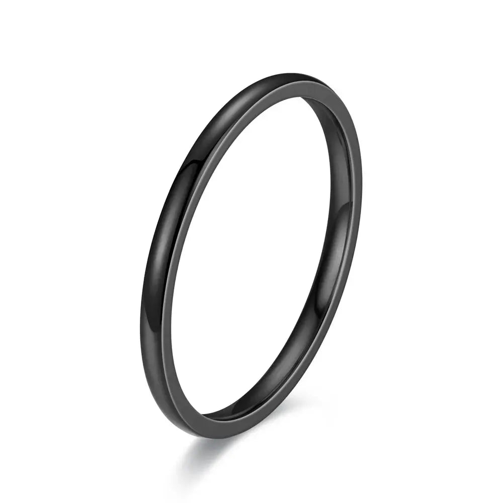 Unisex stainless steel ring with a black matte finish, minimalist fashion jewelry.