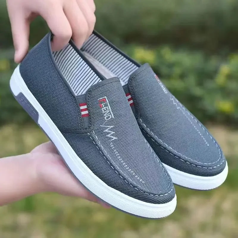 Men's canvas slip-on sneakers, gray breathable youth shoes by Simples Market with white sole