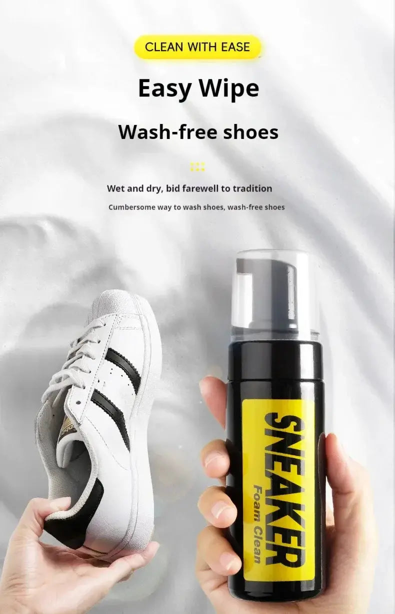 Shoe cleaner foam spray bottle with yellow label beside white sneakers