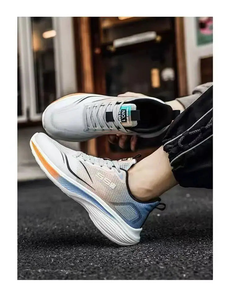 Pair of breathable mesh men's sneakers with white/blue gradient and lightweight sole