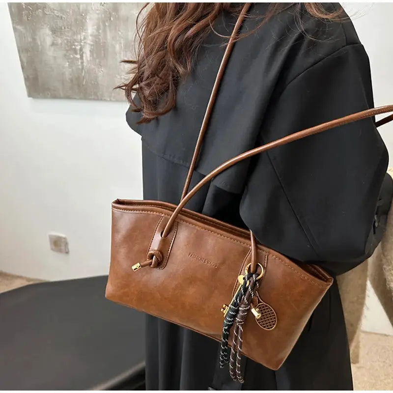 European American Retro Tote Bag, brown leather with a long strap and pendant charms