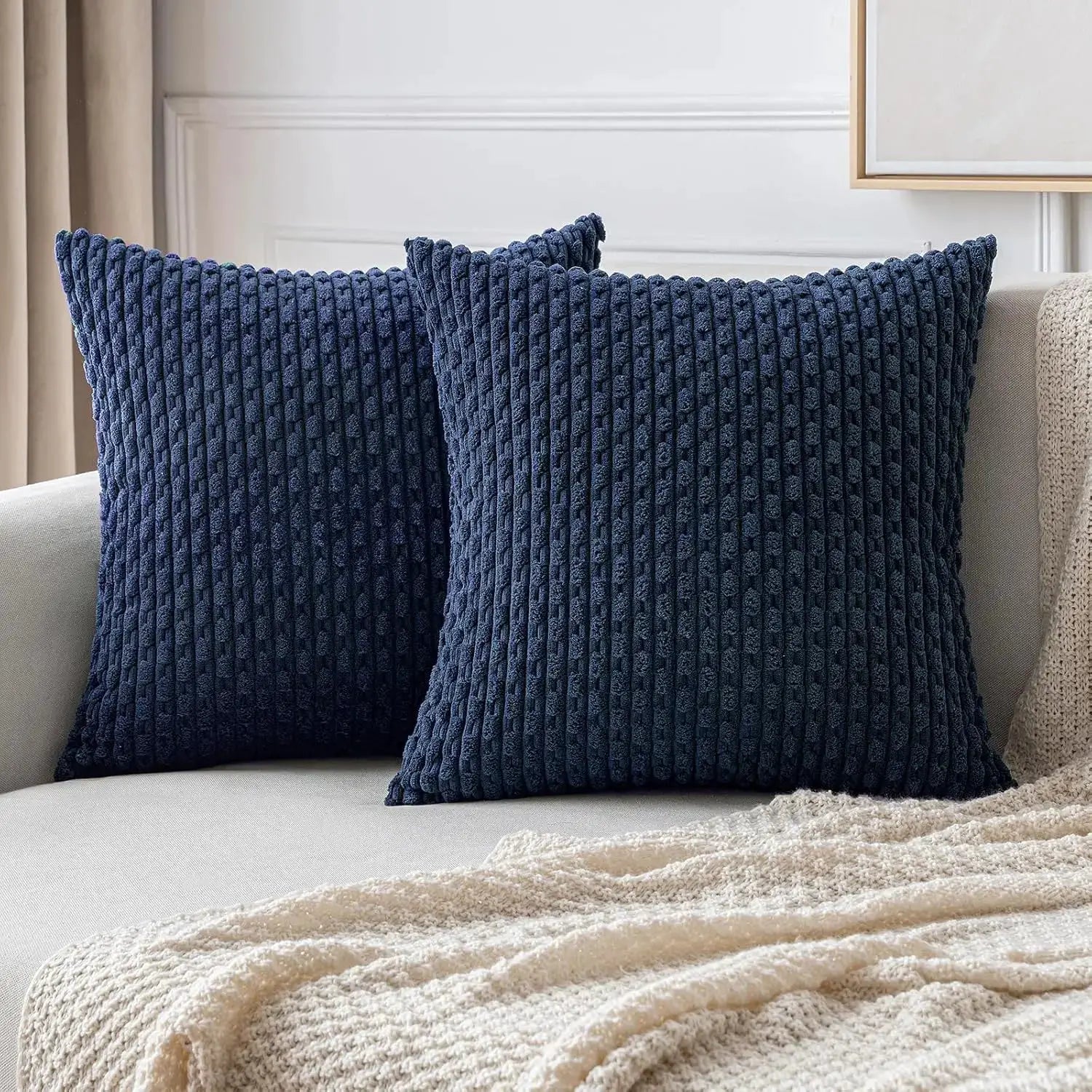 Simples Market navy corduroy fall decorative throw pillows with chunky ribbed texture (2) on sofa
