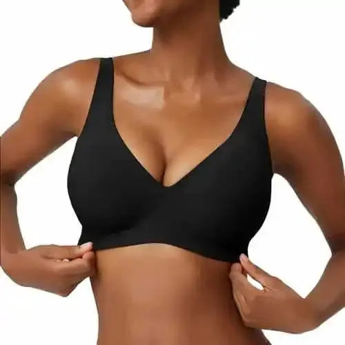 Black wire-free seamless full-cup bra on model; soft, breathable support.