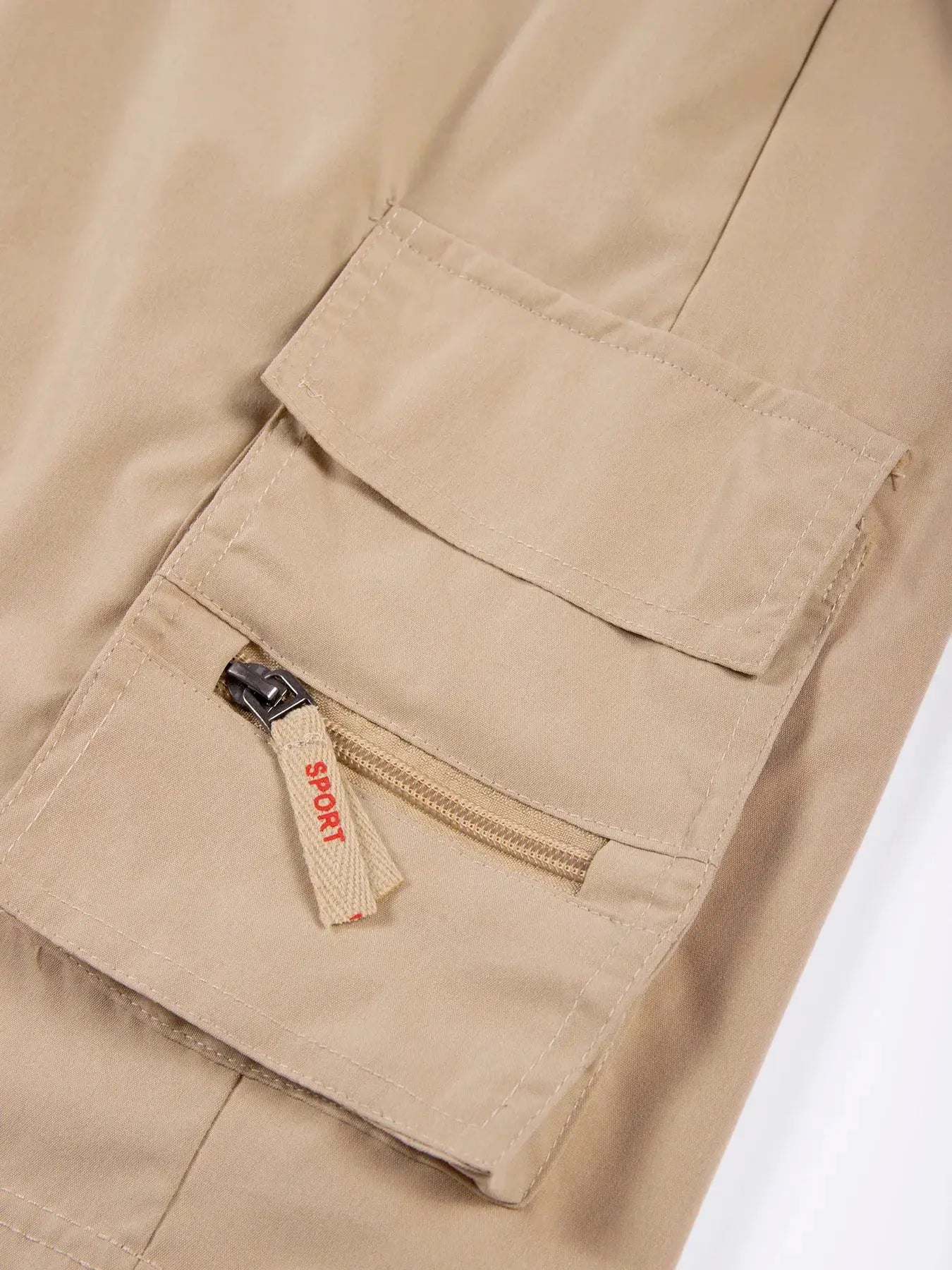 Khaki men's cargo shorts with multiple pockets and front zip pocket for casual outdoor wear