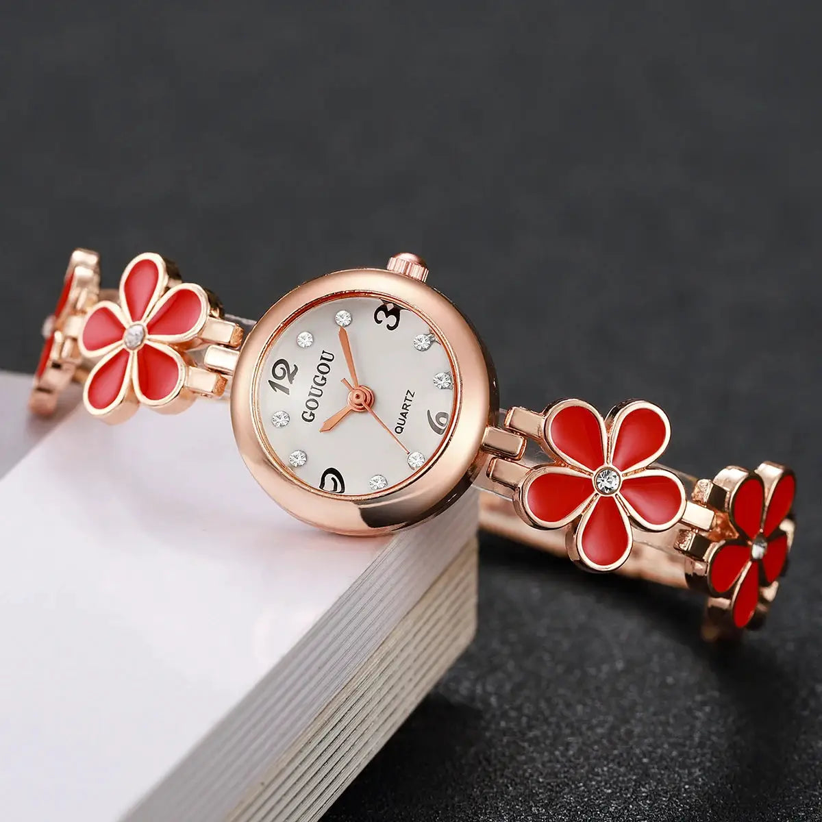 Rose-gold fashion flower bracelet watch with red enamel petals and crystal markers