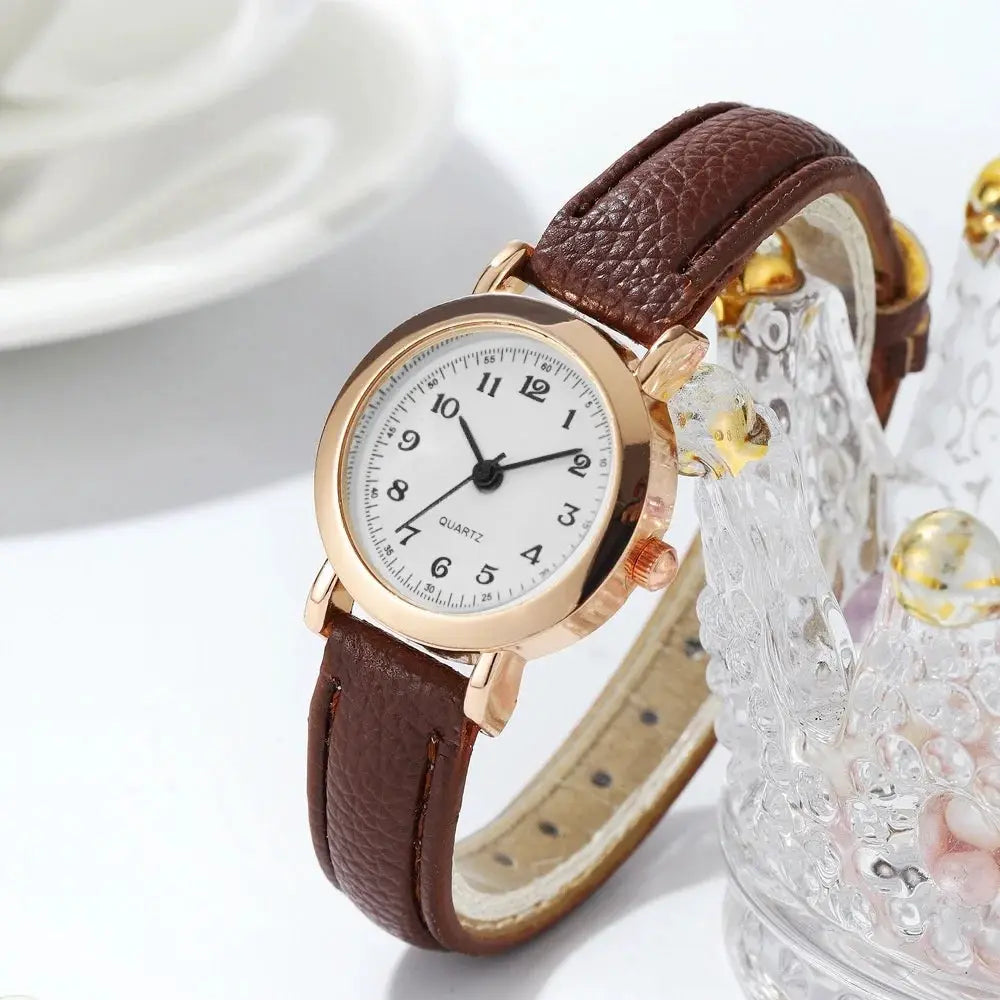 Women's watch with brown leather strap and rose-gold case, white dial with Arabic numerals