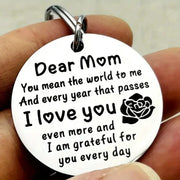 Stainless steel round keychain with engraved Dear Mom I Love You message and rose graphic by Simples Market.