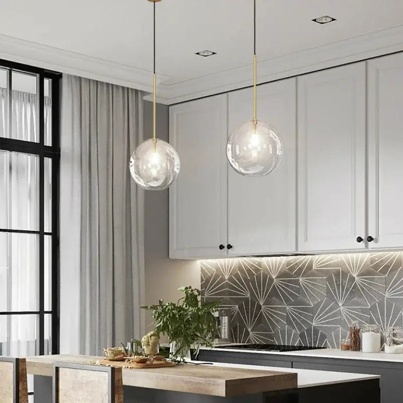 Glass ball pendant lamps by Simples Market, 2-pack, clear glass with gold suspensions, modern kitchen island lighting