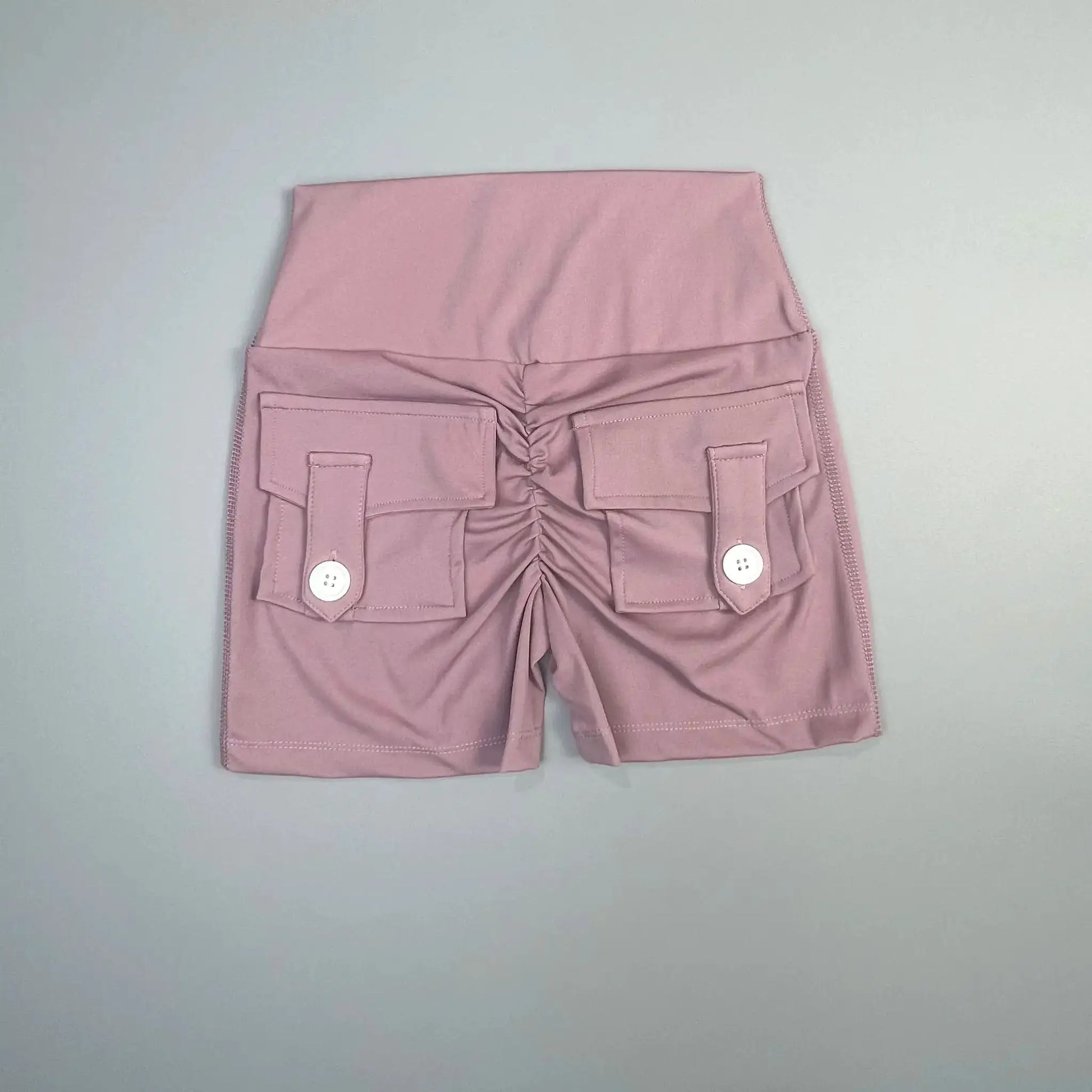 Simples Market peach cargo fitness shorts with front flap pockets and side zippers