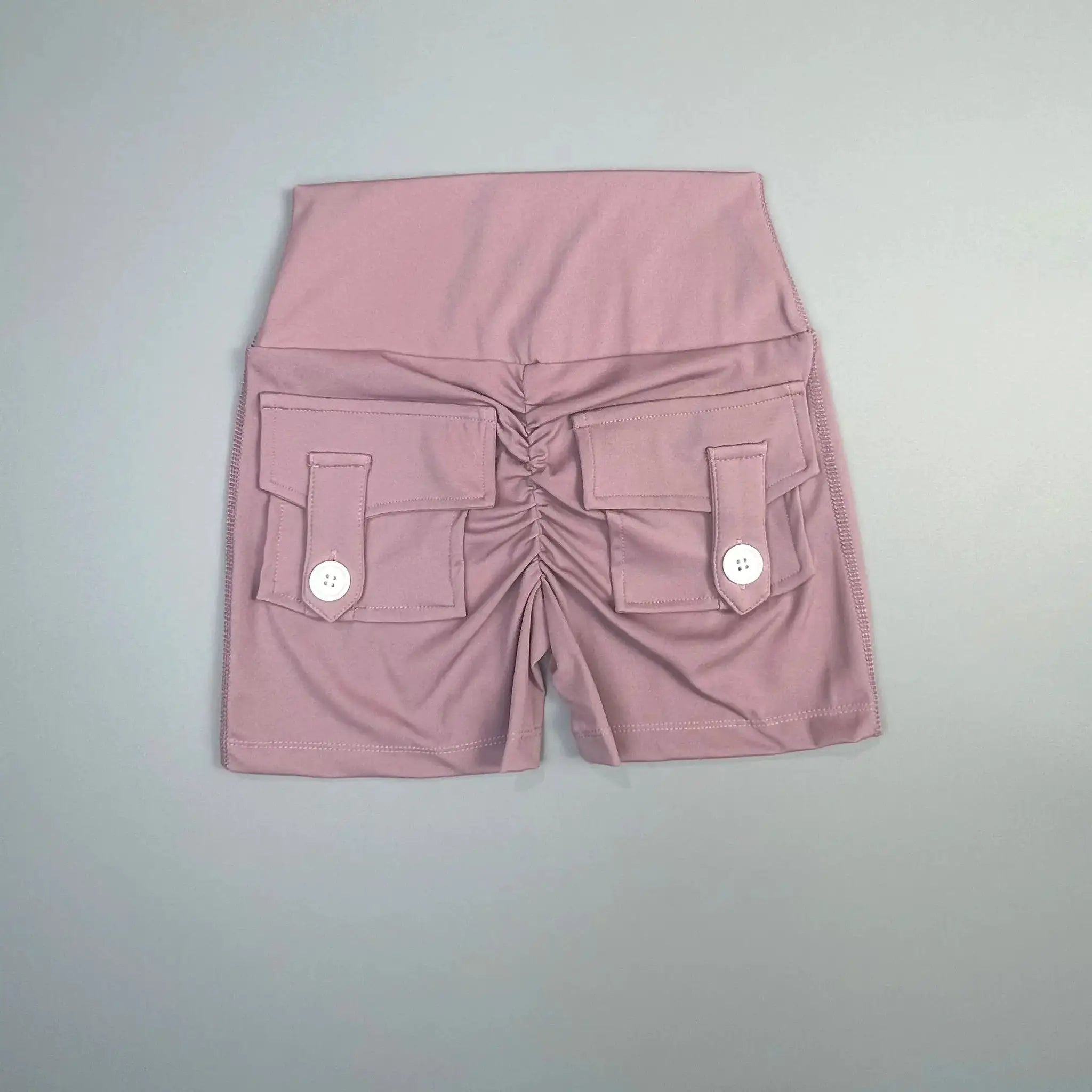 Simples Market peach cargo fitness shorts with front flap pockets and side zippers
