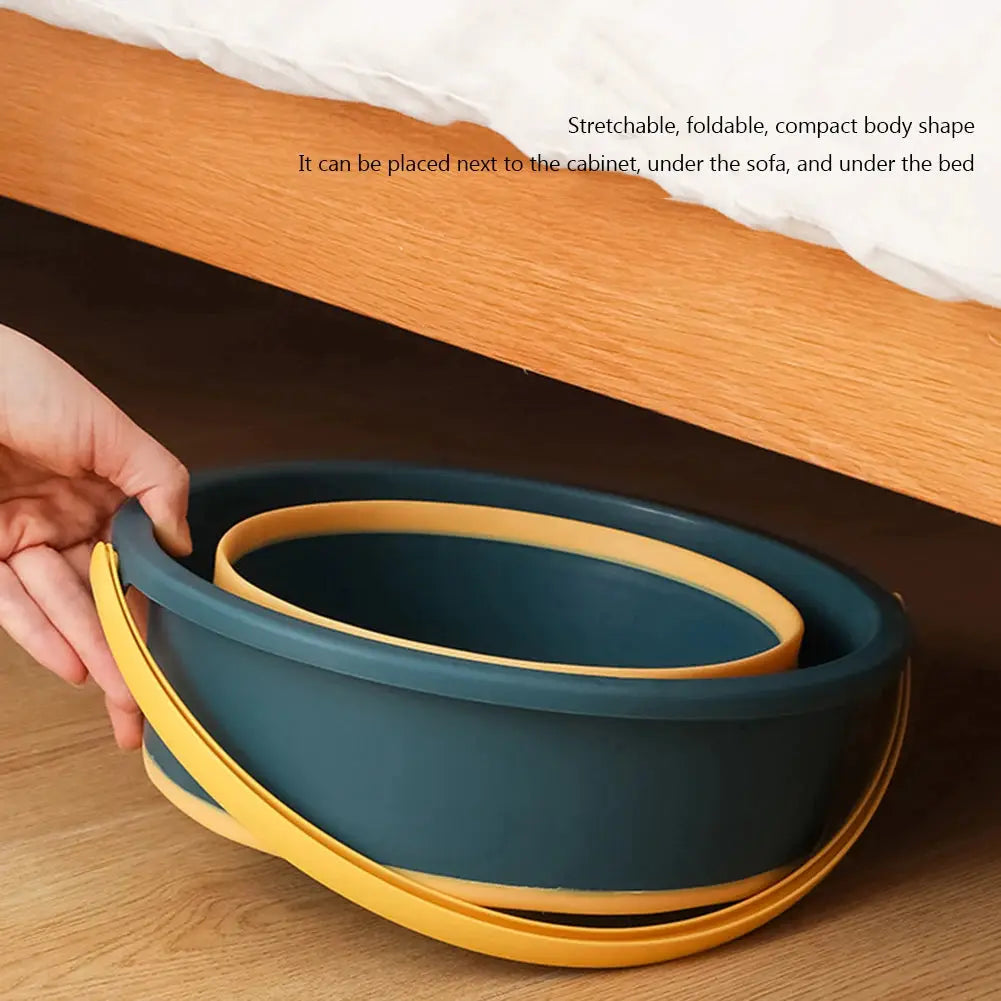 Folding silicone bucket with cover, blue body and yellow rim, compact stackable for camping or car wash.