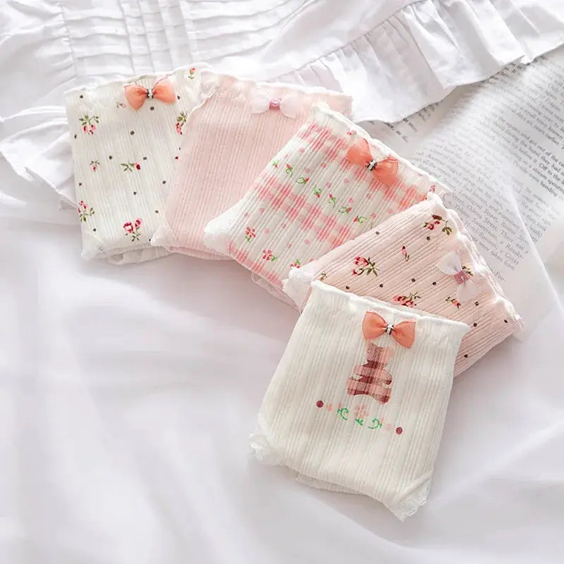 5-piece set of pure cotton mid-waist women's panties with lace, bows, and floral patterns in pastel pink and white