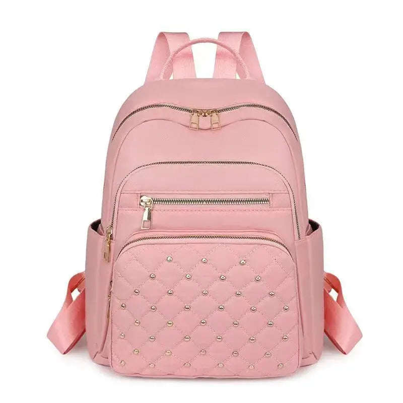Travel backpack pink with quilted front pocket and zip pockets, large-capacity by Simples Market