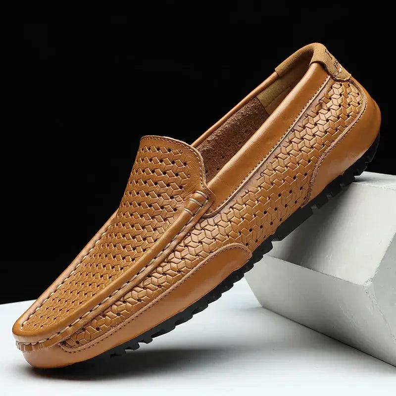 Men's tan leather loafers with woven hollow-out upper, slip-on driving style and black rubber outsole