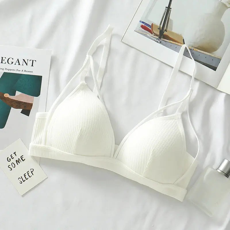 White wire-free triangle-cup bra with adjustable straps and textured fabric