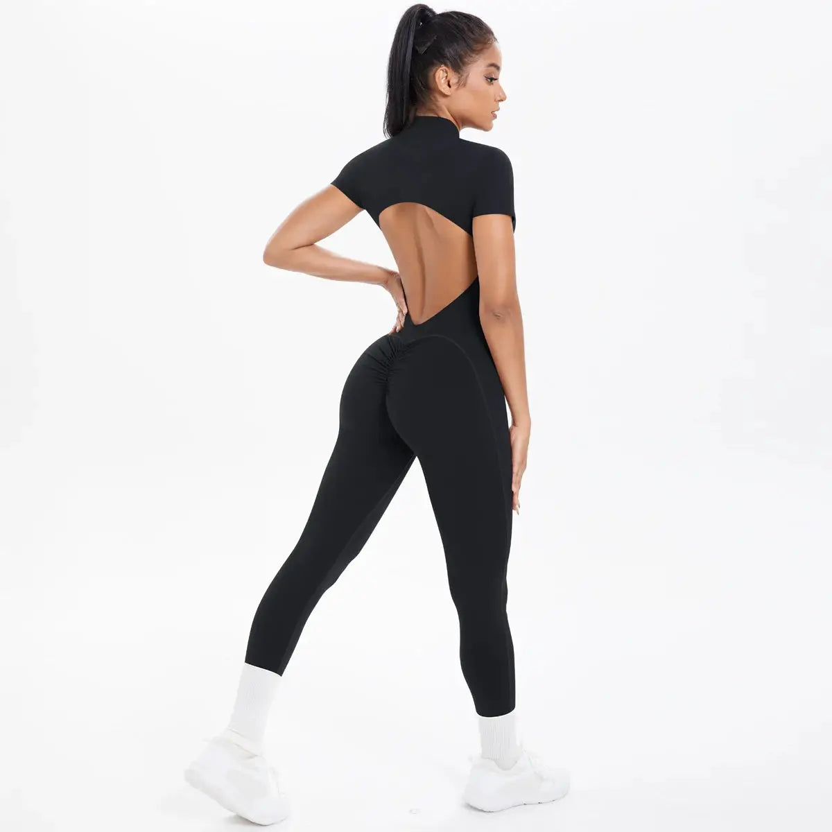 Short-sleeve fitness jumpsuit for women with a backless cutout and scrunch rear in black