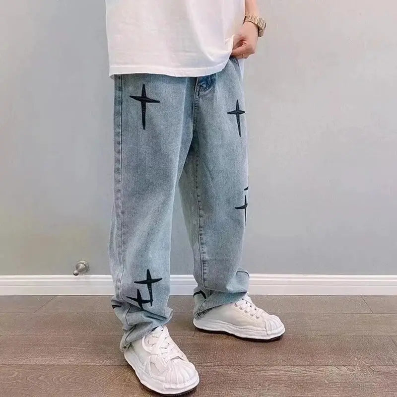 Men's light-blue denim cargo pants with star prints, loose wide-leg style by Simples Market