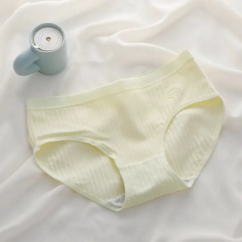 Women's high-waist cotton briefs in pale yellow ribbed fabric, antibacterial underwear.