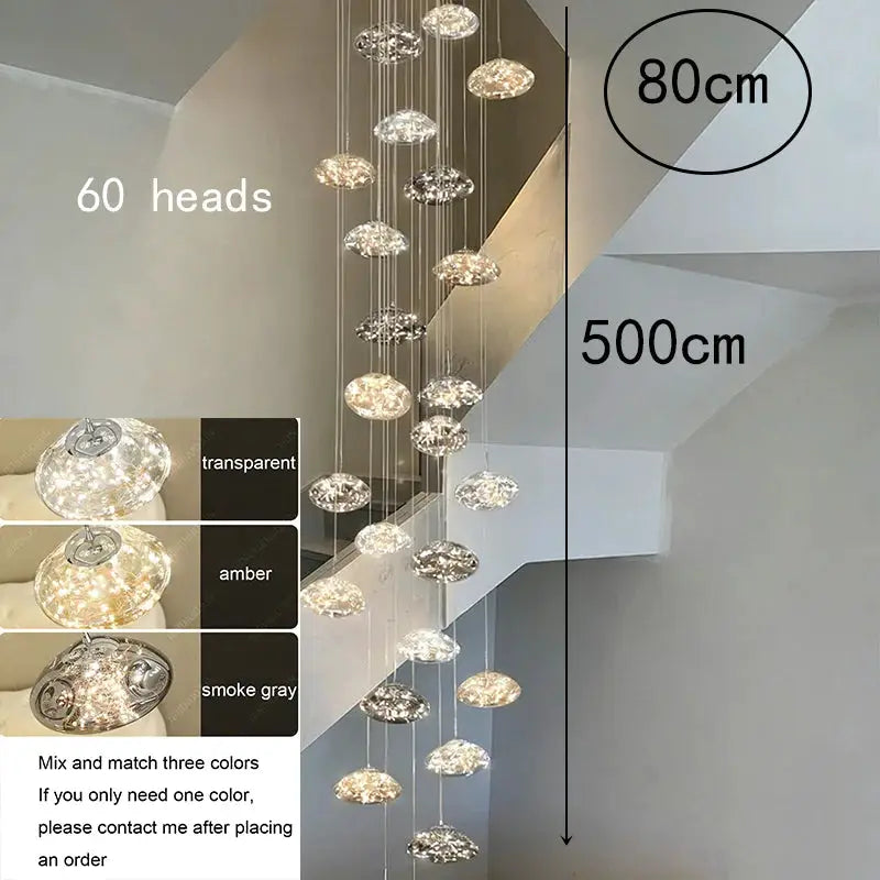 Pendant lights by Simples Market; 60 crystal discs on wires, LED, transparent/amber/smoke gray