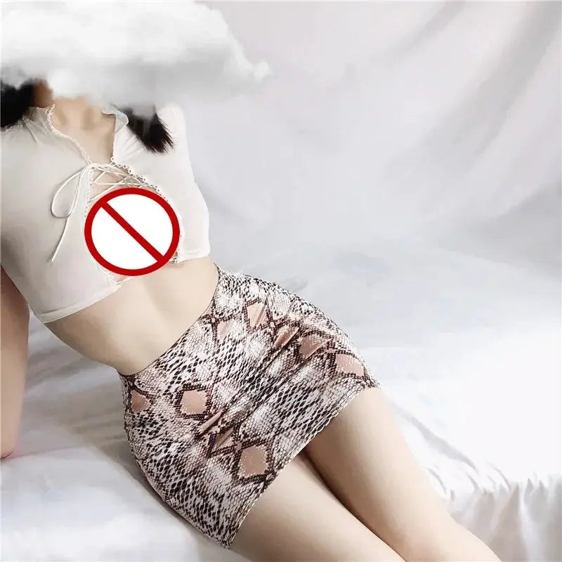 Snake-print micro mini skirt; women's hip-hugging fit in beige-brown tones