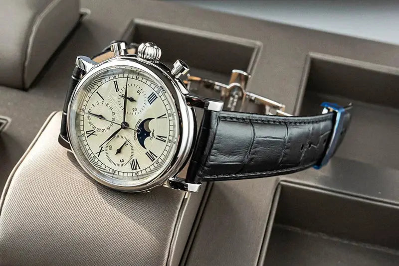 Sugess ST1908 men’s wristwatch with moonphase calendar, white dial, silver case, black leather strap.