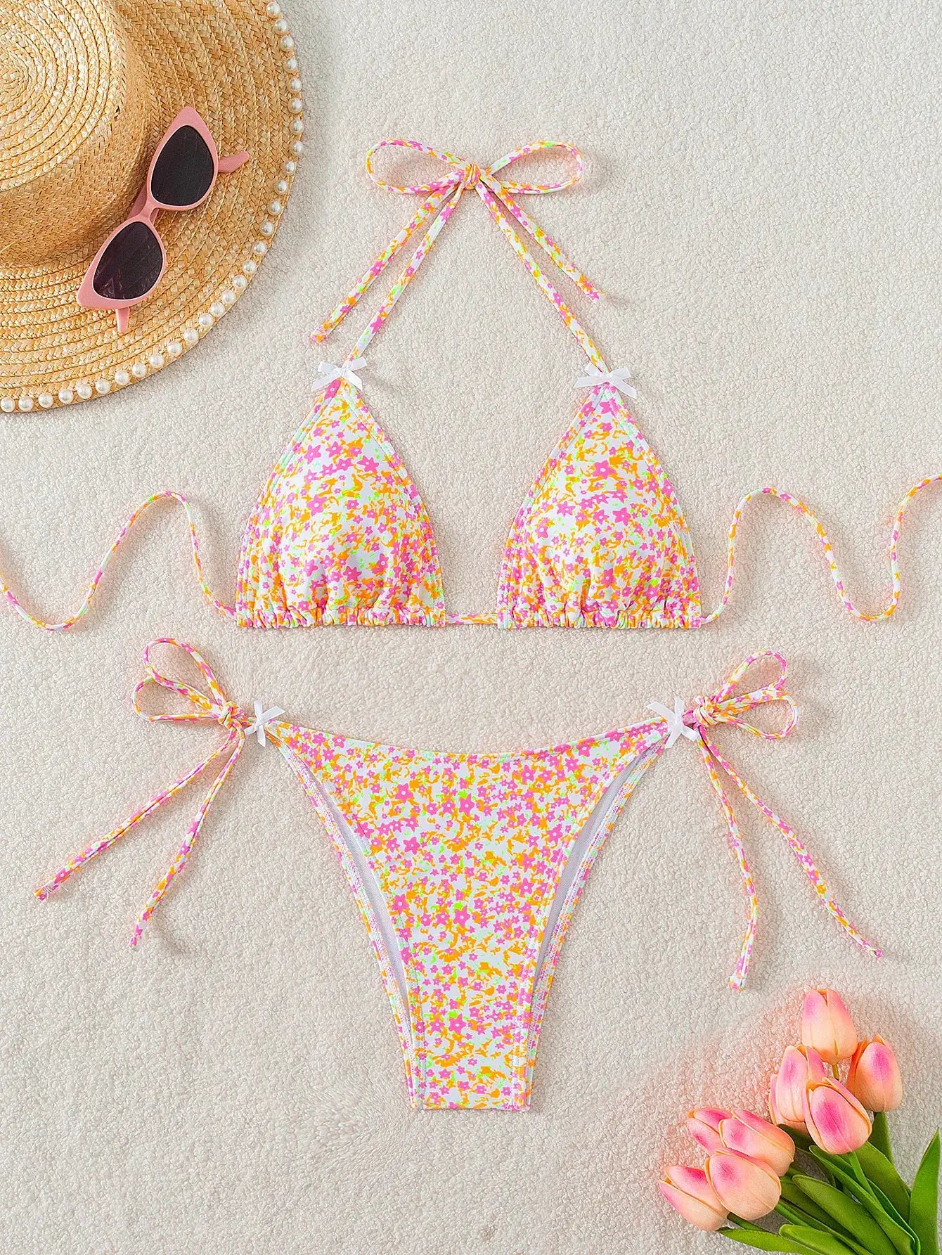 Women's floral bikini set by Simples Market with adjustable tie sides, two-piece swimwear