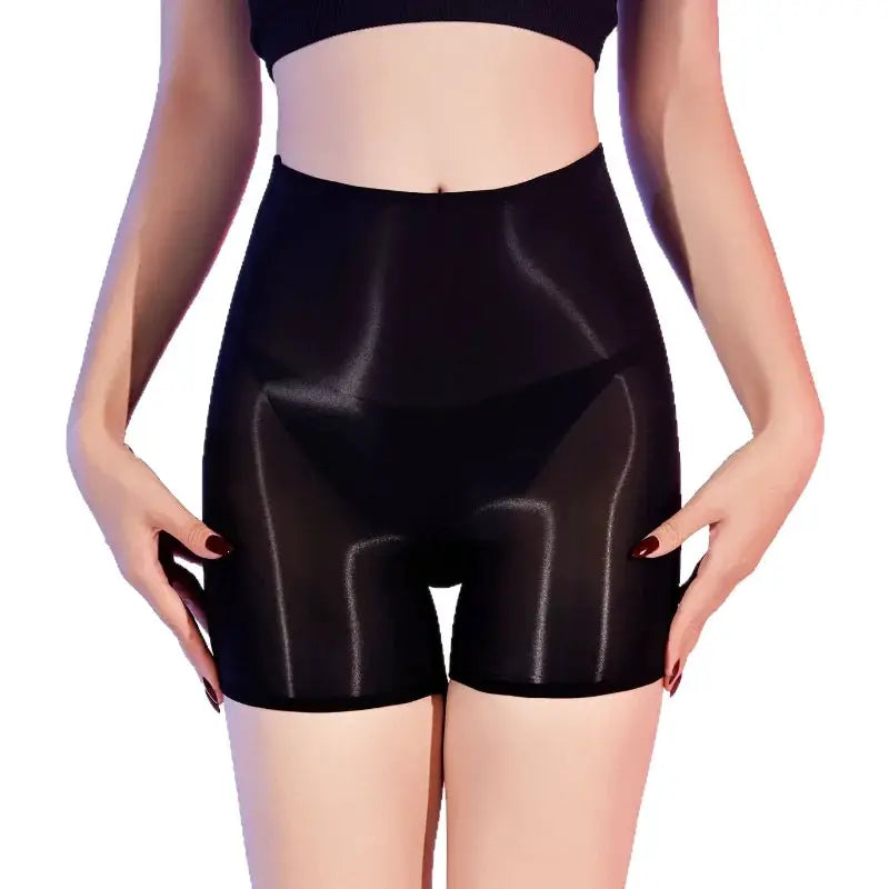 Women's glossy black high-waist boxer shorts with a latex-like shine