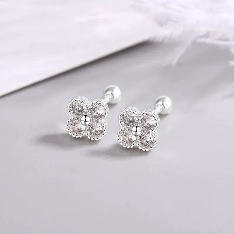 Pair of sterling silver flower-shaped four-round zircon stud earrings