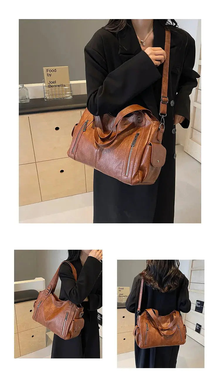 Brown PU leather shoulder bag with dual front zip pockets and an adjustable strap