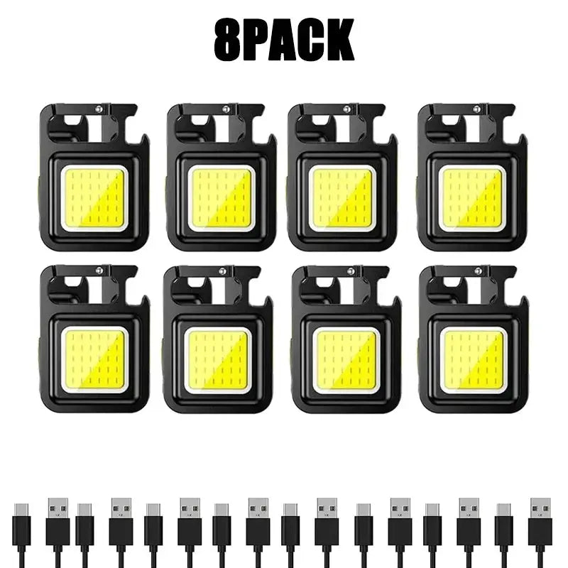 Simples Market 8-pack keychain lights; USB rechargeable LED COB flashlights, black with yellow panels