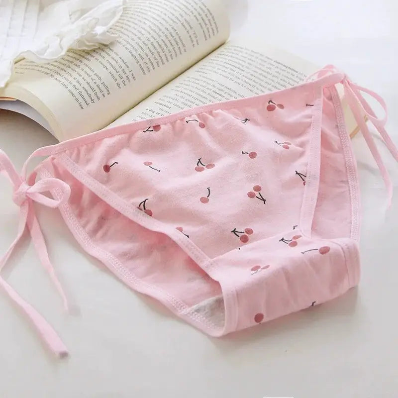 Pink cherry-print lace-up briefs with side bows, low-rise women’s underwear