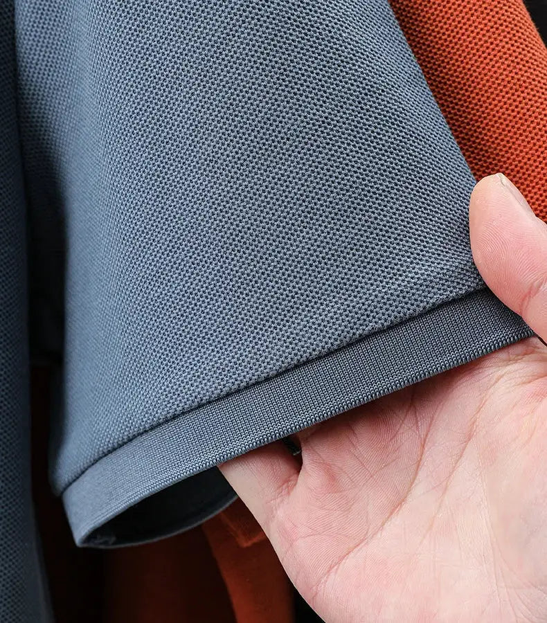 Polo shirt, blue short-sleeve cotton with fine pique knit and folded hem