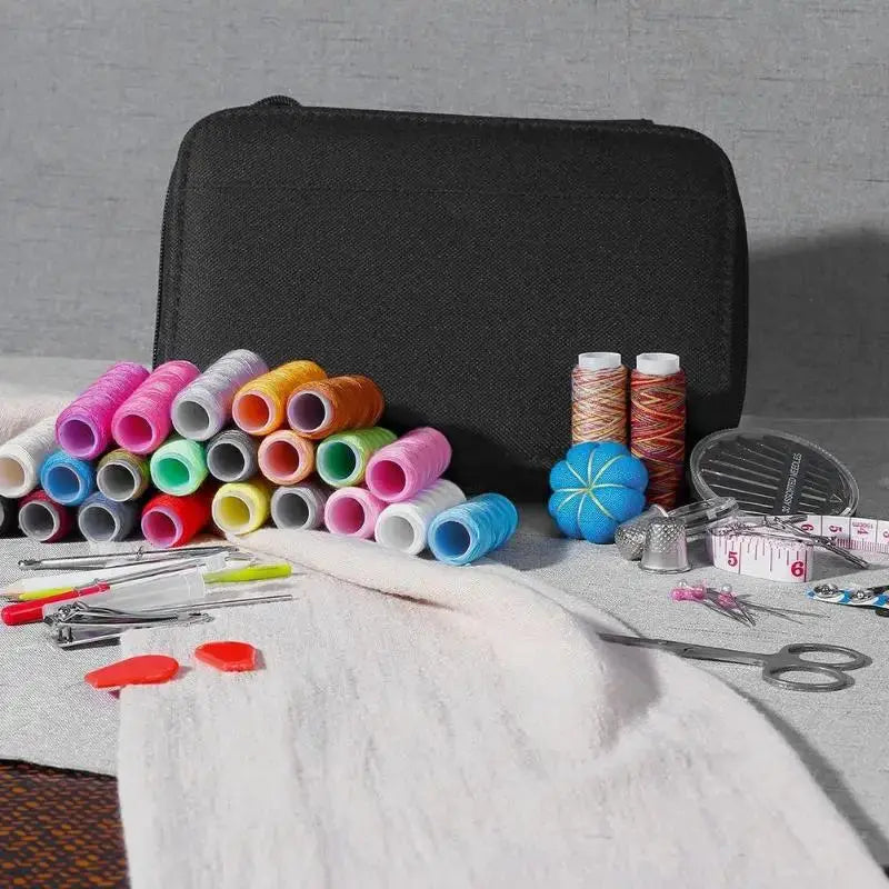 Simples Market sewing kit set with colorful thread spools, scissors and measuring tape in a black carrying case