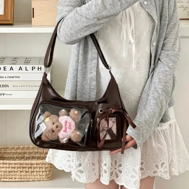 Brown Y2k Harajuku transparent ita bag with clear PVC panels; crossbody purse featuring teddy bears and a photo pocket.
