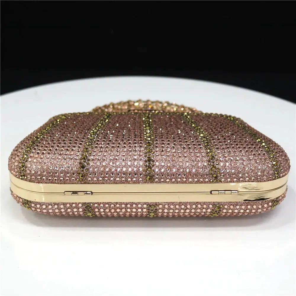 Rhinestone evening clutch bag in rose-gold with gold-tone frame and long chain