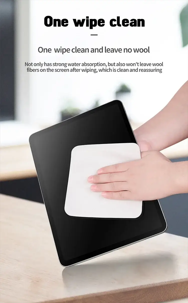Polishing cloth for Apple devices by Simples Market; white nano-texture screen cleaning cloth being used on a tablet