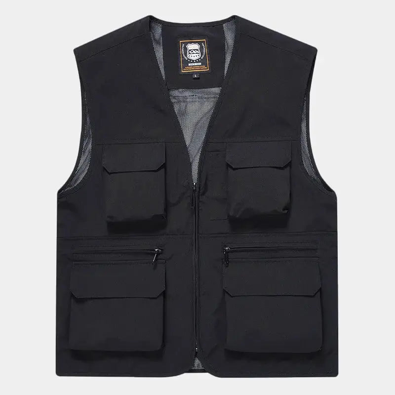Men's black FGKKS utility vest with multiple pockets and zip front