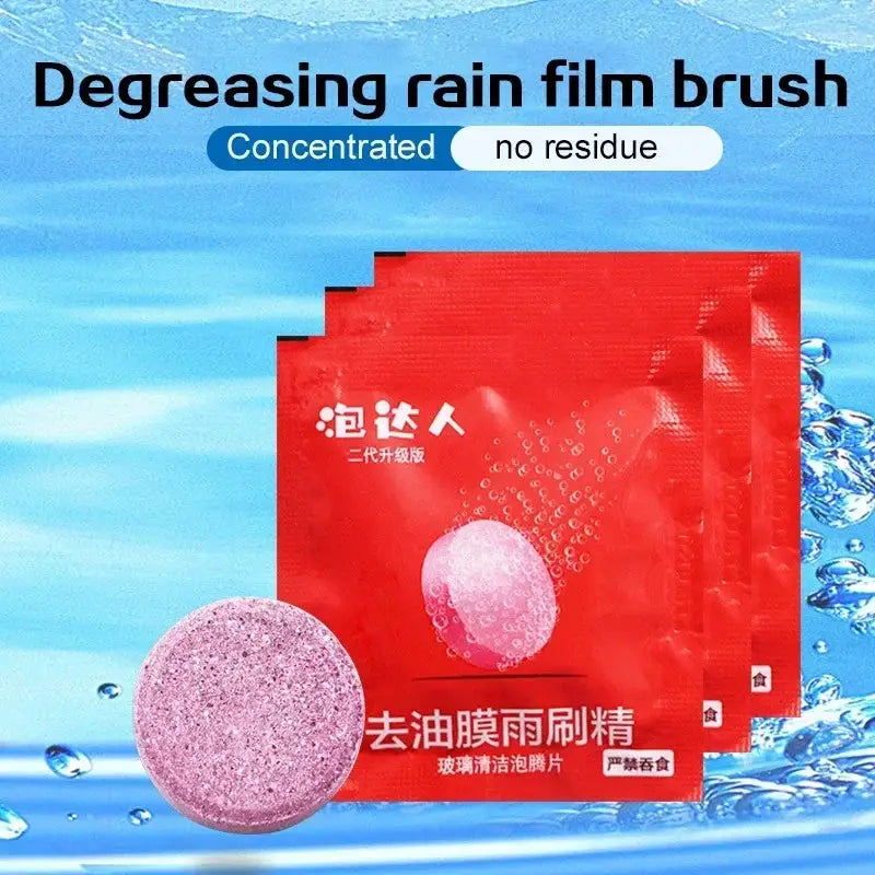Car windshield cleaner effervescent tablets; pink round disc with 3 red sachet packs.