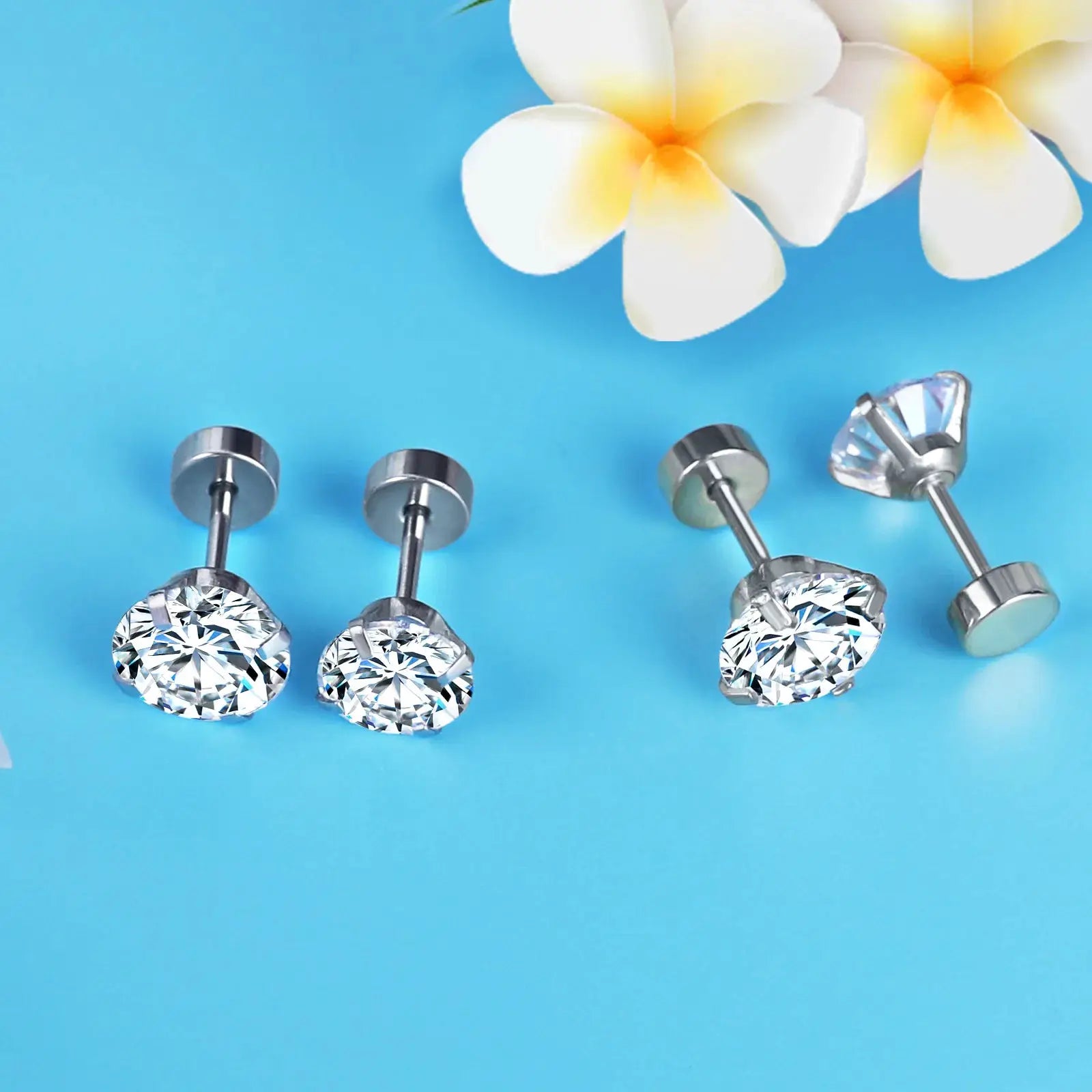 LUXUSTEEL stainless steel crystal stud earrings with round clear cubic zirconia, 4-prong setting; 4 pieces shown