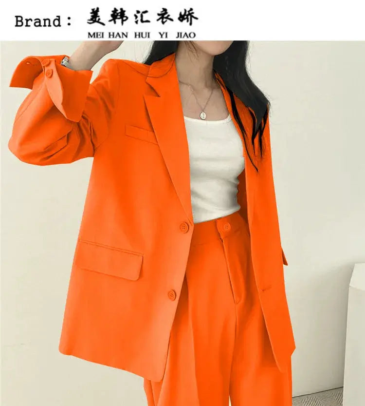 Women's orange long-sleeve blazer and pants 2-piece set by Simples Market, casual outfit.