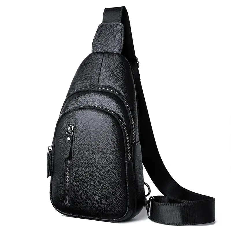 Black genuine pebbled leather chest bag for men with crossbody strap and multiple zipped pockets.