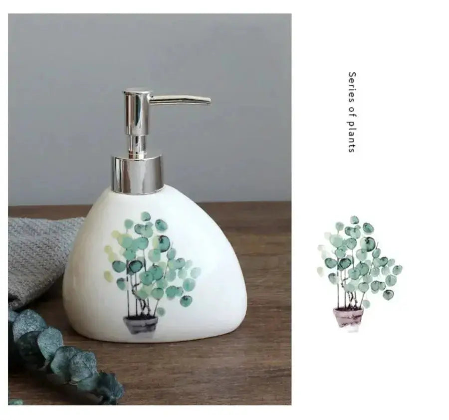 White ceramic soap dispenser with chrome pump and green plant motif for bathroom.