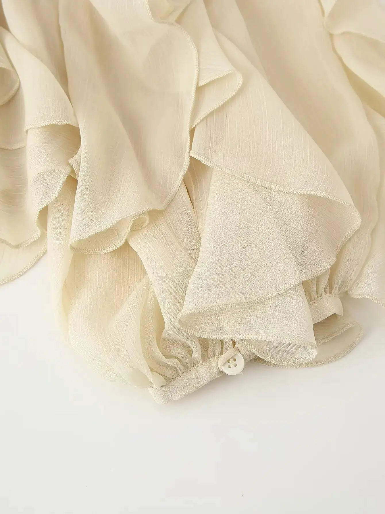 YENKYE semi-sheer ruffle blouse, cream color with long sleeves and front buttons