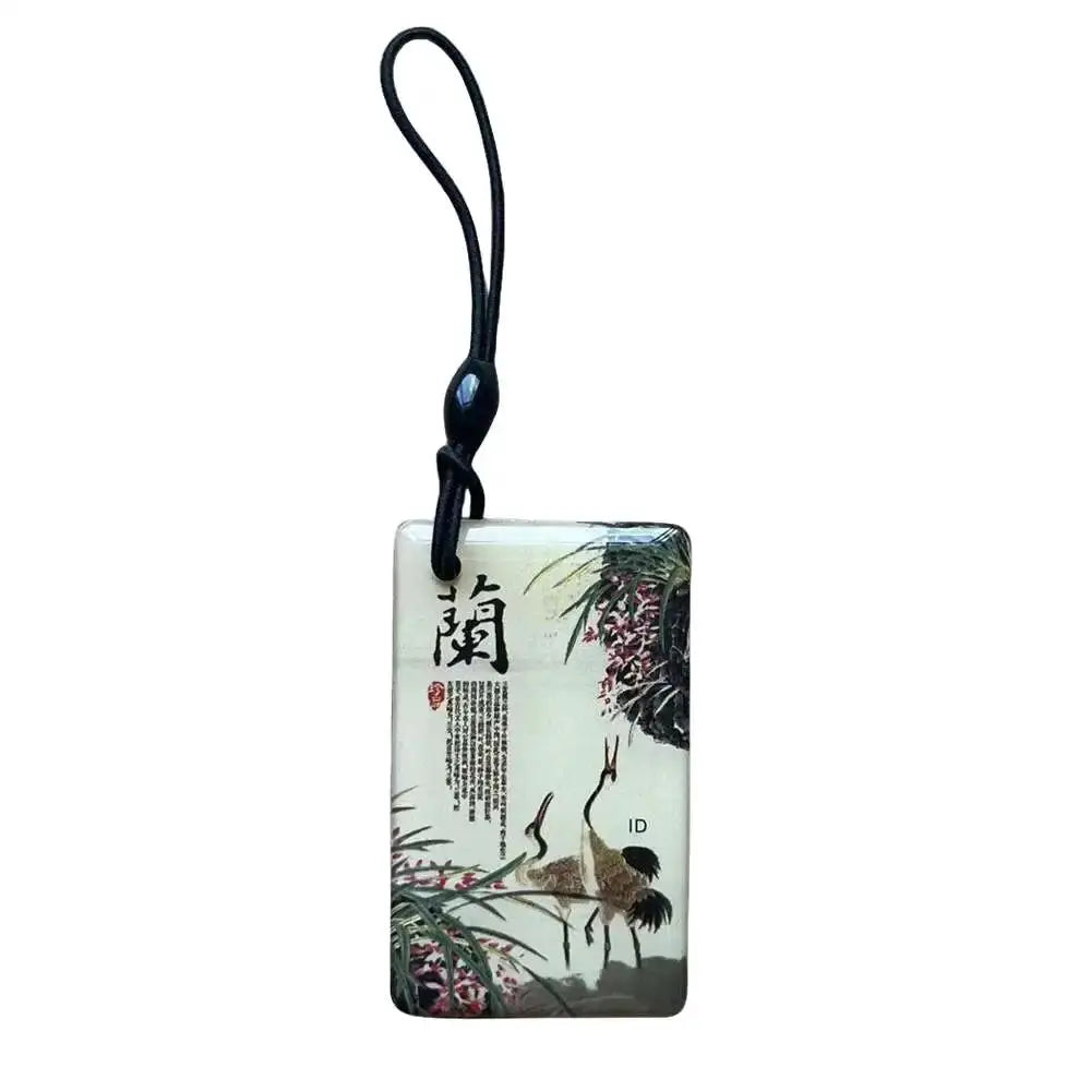 Simples Market RFID key tag 125KHz EM4305/T5577 blank plastic card with black lanyard and crane artwork