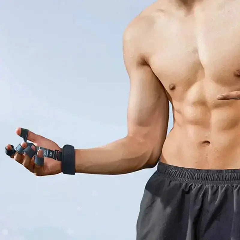 Simples Market 5-Finger Trainer silicone wrist grip on a muscular arm; black finger bands for grip strength and therapy