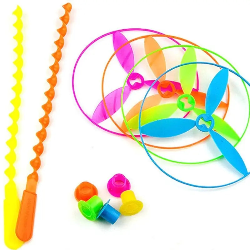 Twenty Piece Colorful Bamboo Dragonfly Plastic Hand Push Flying Toys For Kids Party Favors And School Goodie Bags