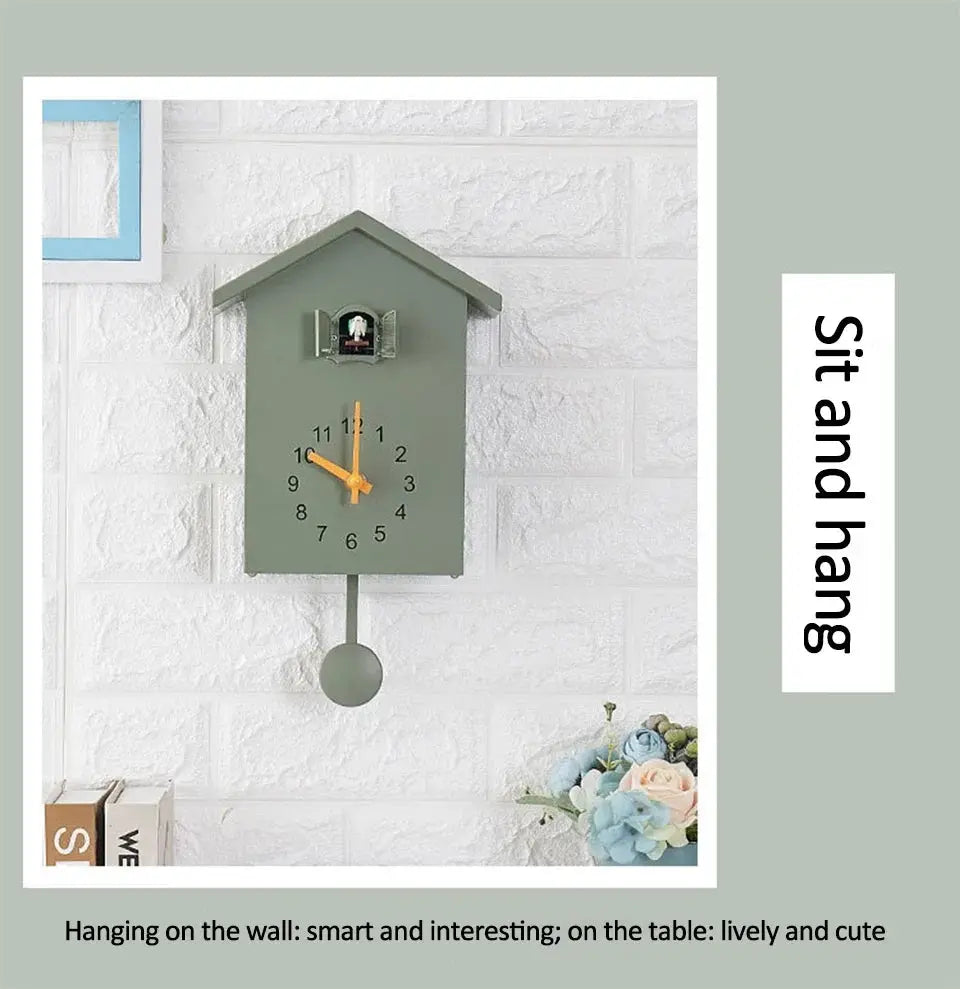 Cuckoo quartz wall clock by Simples Market, 20x25cm, green with yellow hands and pendulum.