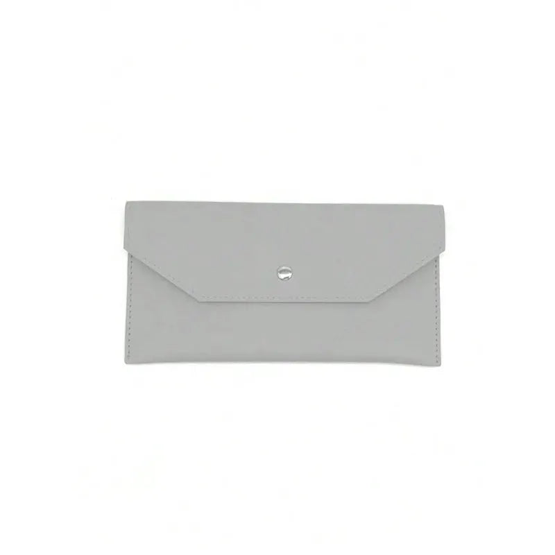 Women's gray leather envelope-style wallet with snap closure.
