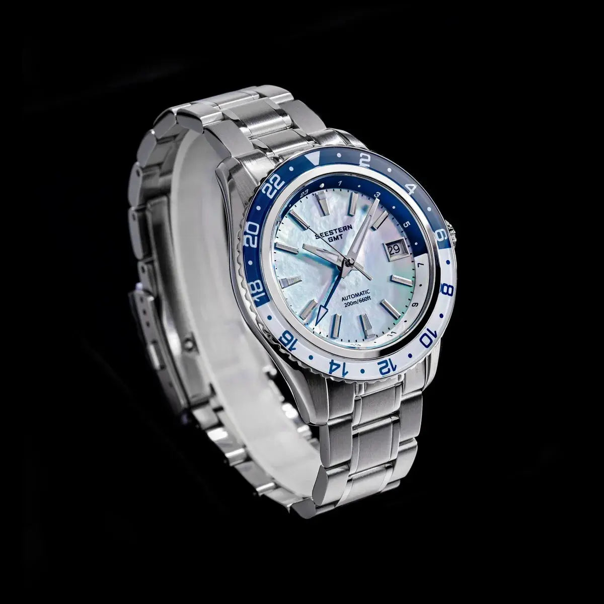 SEESTERN GMT automatic wristwatch with stainless steel bracelet, blue bezel and mother-of-pearl dial
